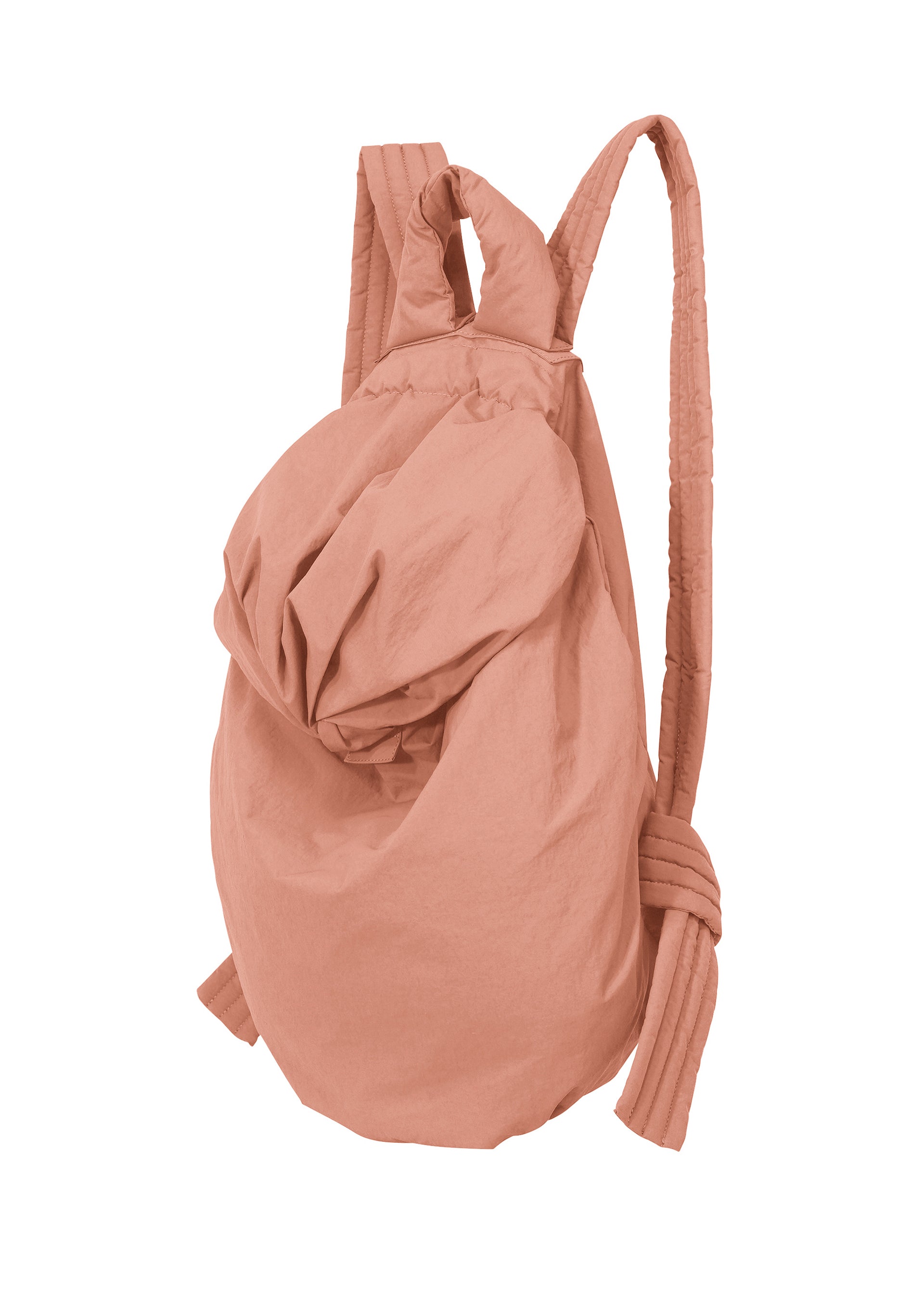 Zoomed view The FUWA FUWA by GOOD GOODS ISSEY MIYAKE is a pink zero-waste backpack featuring a knot, inspired by Japanese workwear.