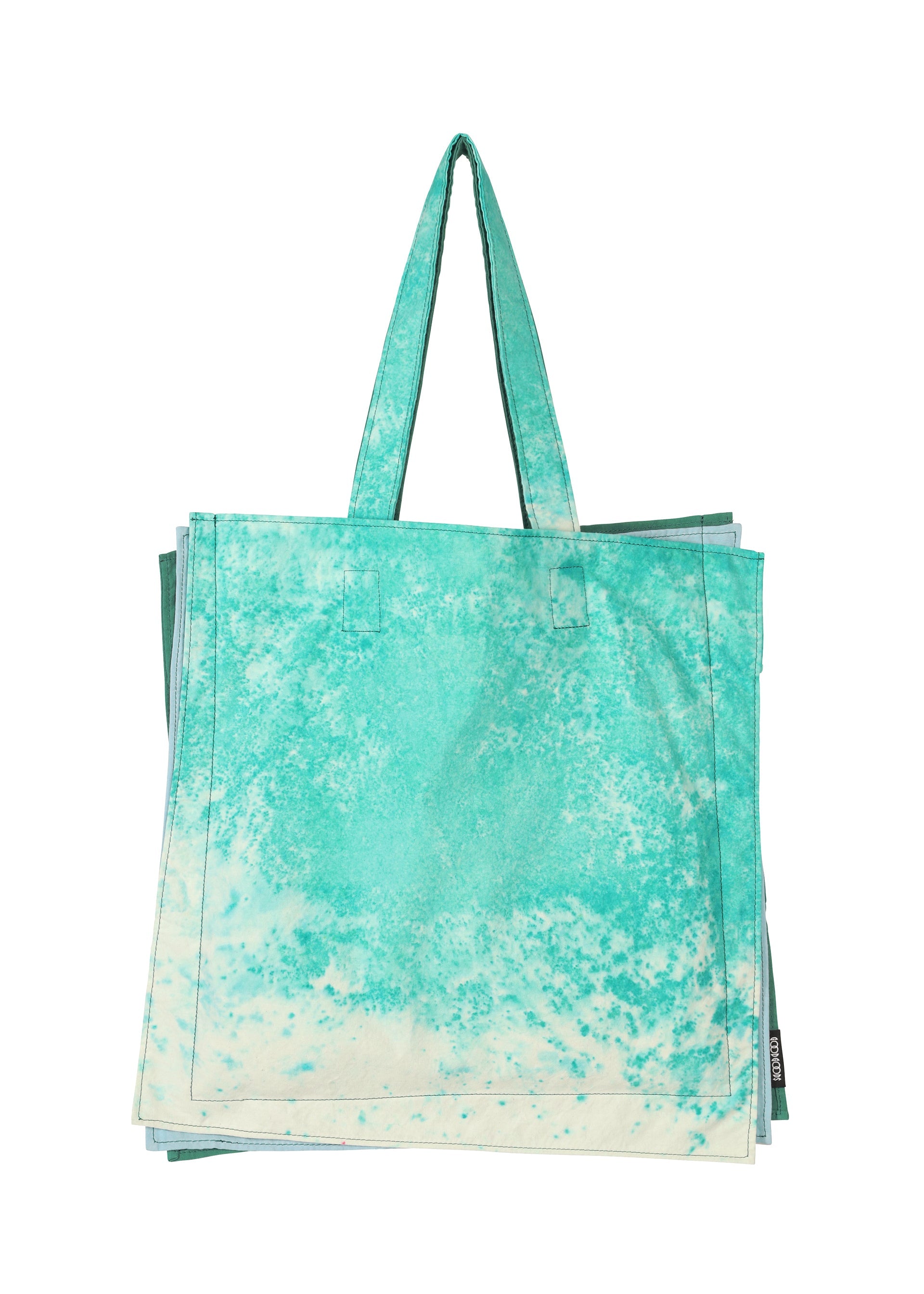 Zoomed view The GOOD GOODS ISSEY MIYAKE IROGAMI SALT DYE tote bag, featuring two handles and a turquoise-white marbled Shio-zome pattern, is shown laid flat on a white background. - GREEN MIX （no.64）
