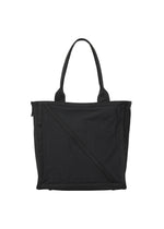 The WAKU tote by GOOD GOODS ISSEY MIYAKE features a plain black design with wide gussets, two handles, and a subtle diagonal front seam, shown against a white background. - BLACK （no.15）