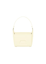 The BOX bag by GOOD GOODS ISSEY MIYAKE features a minimalist, pale yellow, rectangular design with a single curved handle, displayed against a plain white background. - CREAM(no.50)