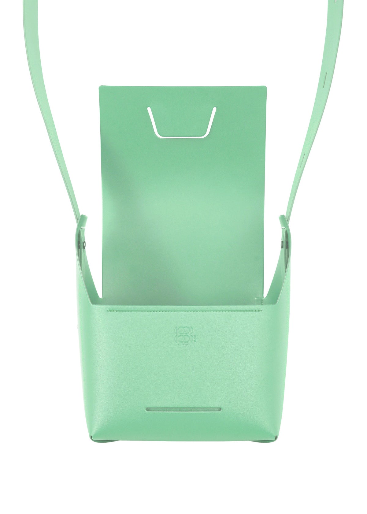 The BOX bag by GOOD GOODS ISSEY MIYAKE is a minimalist mint green, box-inspired design with a structured shape, open front flap, and thin strap, shown against a white background. view 6 of 11