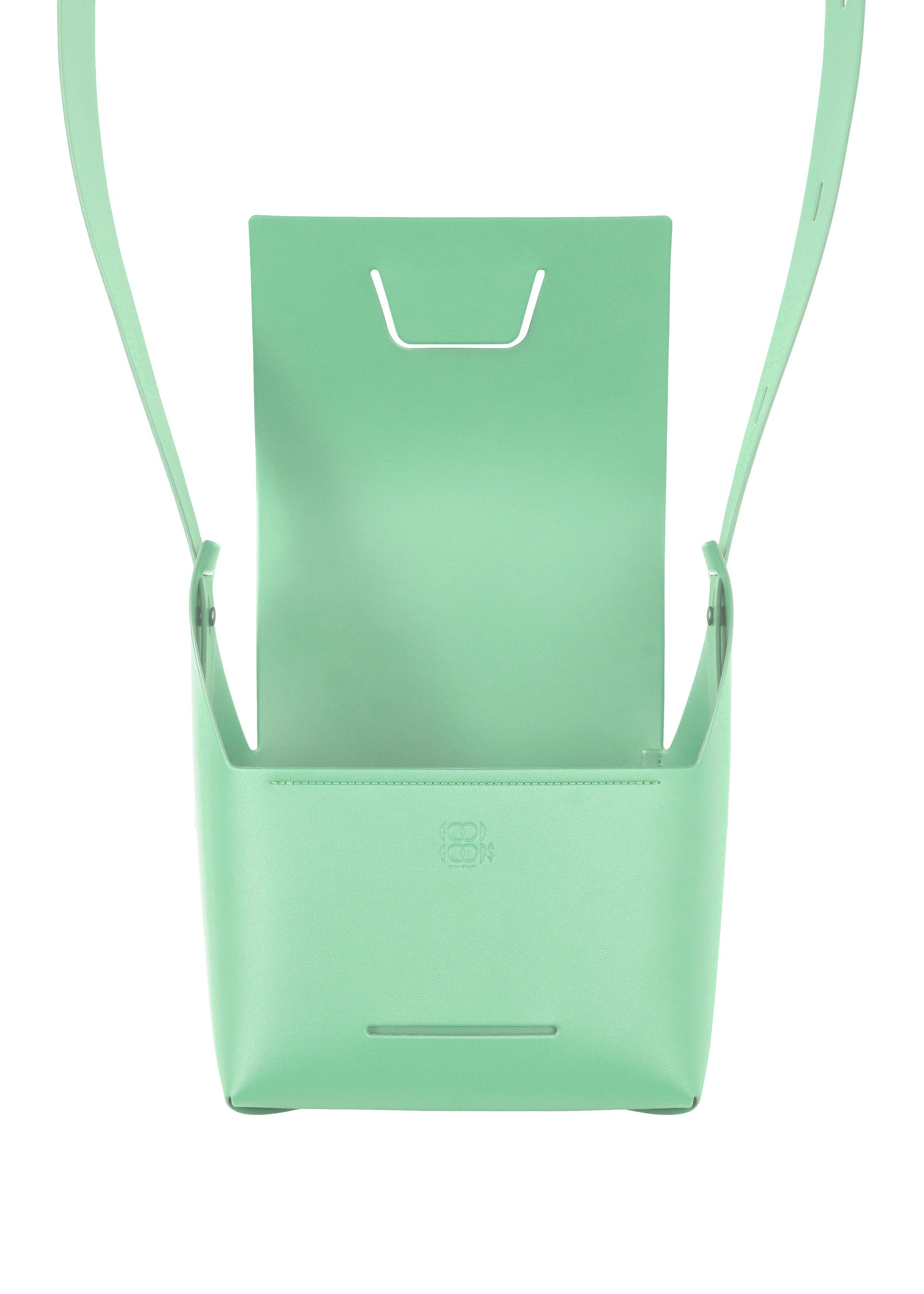 Zoomed view The BOX bag by GOOD GOODS ISSEY MIYAKE is a minimalist mint green, box-inspired design with a structured shape, open front flap, and thin strap, shown against a white background.