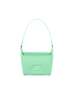 The BOX bag from GOOD GOODS ISSEY MIYAKE is a mint green, rectangular shoulder bag with a single curved handle. Its minimalist design features subtle front embossing, adding elegance to this box-inspired accessory shown against a white background.