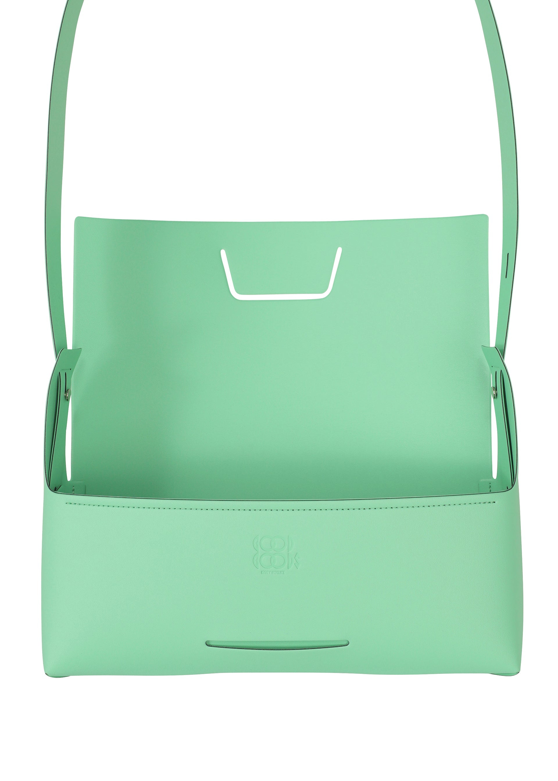 Zoomed view The BOX by GOOD GOODS ISSEY MIYAKE is a minimalist light green convertible shoulder bag with a box-inspired structured design, wide flap closure, and single strap, shown open against a white background.