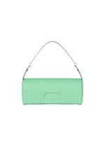 The BOX handbag by GOOD GOODS ISSEY MIYAKE is a minimalist mint green bag with a cylindrical shape, curved top handle, and small rectangular front flap, inspired by box-shaped designs and shown on a white background.