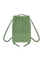 The MOKKO KNAPSACK by GOOD GOODS ISSEY MIYAKE is a lightweight, washable green mesh bag with wide upper slits, a solid bottom, and two knotted rope shoulder straps—perfect for daily use.