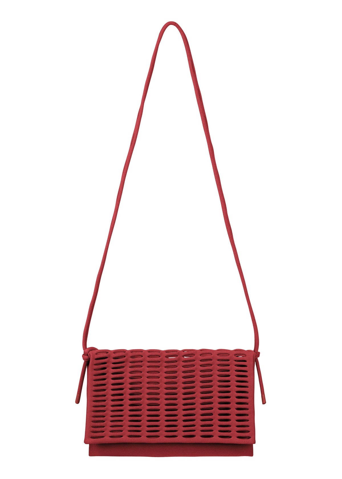 The MOKKO FLAP POUCH by GOOD GOODS ISSEY MIYAKE is a red shoulder bag with a long strap and a flap of evenly spaced horizontal cutouts. Washable and modern, it’s ideal for everyday use with its minimalist design. view 1 of 12