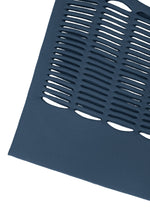 A close-up of the MOKKO S.C. dark blue knit tote bag by GOOD GOODS ISSEY MIYAKE, featuring evenly spaced oval cutouts in horizontal rows. Stylish and washable, this tote is ideal for Spring Summer 2026.