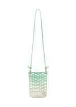 The MOKKO NET GRADATION by GOOD GOODS ISSEY MIYAKE is a small, eco-friendly mint green and white crossbody bag with a long strap and cut-out mesh pattern, shown against a white background. - ICE GREEN （no.69）