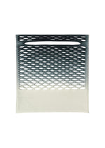 The MOKKO NET GRADATION from GOOD GOODS ISSEY MIYAKE is a rectangular, flat bag with a black-to-white gradient, oval cutouts, and an oval slot at the top center, resembling a lightweight knit. Displayed on a plain white background.