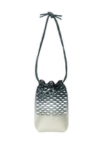 The MOKKO NET GRADATION by GOOD GOODS ISSEY MIYAKE is a small, square bag made from recycled fishing nets, featuring a white-to-dark gray gradient, cut-out mesh design, and a knotted shoulder strap. - DEEP OCEAN BLUE （no.74）