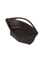 The MOKKO BASKET by GOOD GOODS ISSEY MIYAKE is a dark brown, shallow basket bag with a curved handle, shown at an angle against a white background.