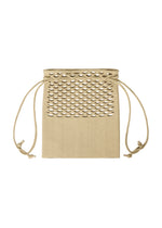 The MOKKO BASKET by GOOD GOODS ISSEY MIYAKE is a beige knit drawstring bag featuring woven cutout details on the upper half and two long side cords, shown against a white background.