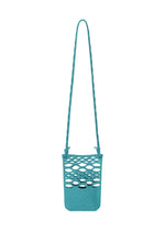 The MOKKO BASKET by GOOD GOODS ISSEY MIYAKE is a teal bag with a long strap and basket-like design, featuring large circular cutouts on the upper half. Shown against a white background. - LIGHT TEAL BLUE×MARINE BLUE （no.77）