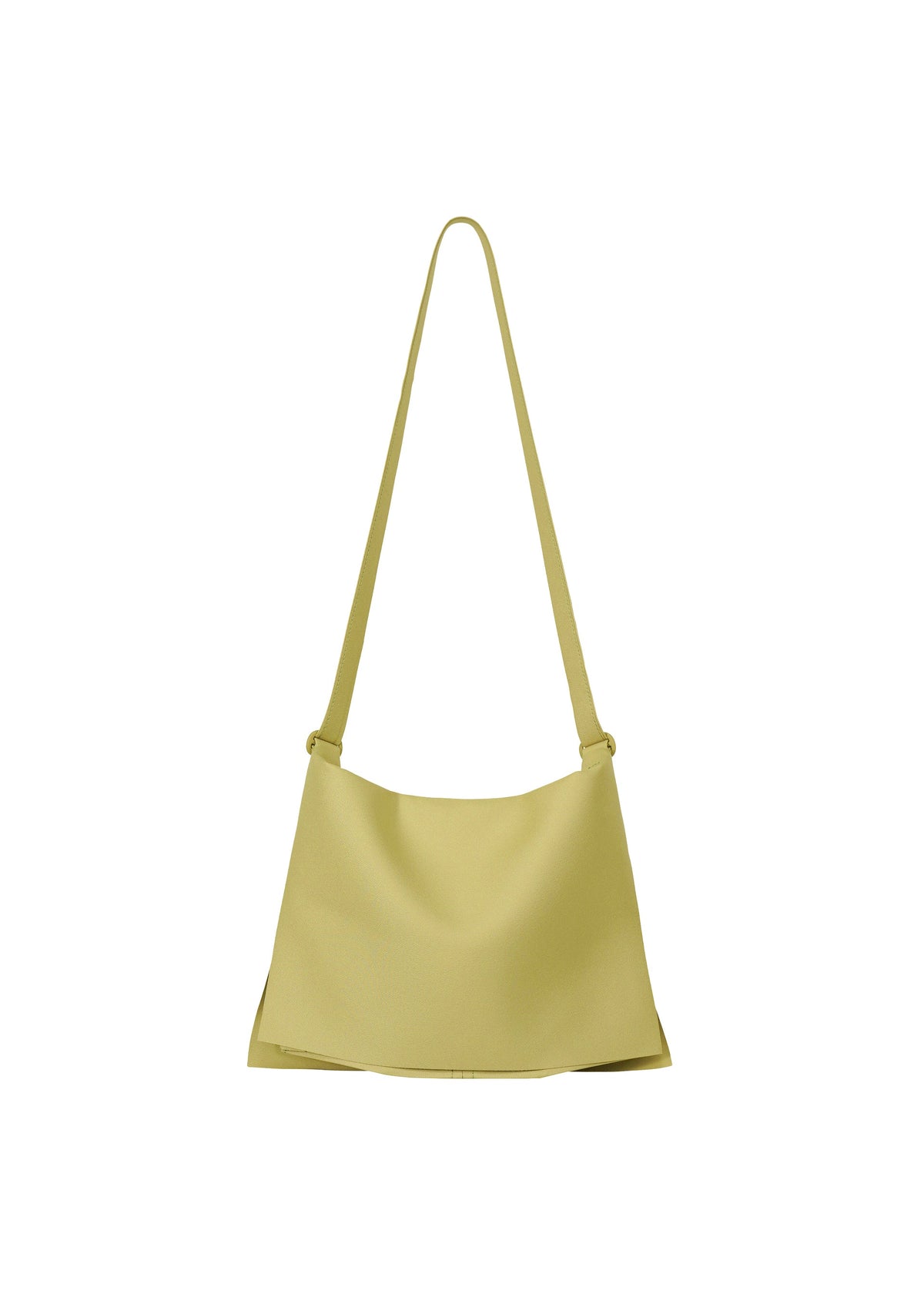 The ROLL by GOOD GOODS ISSEY MIYAKE is a minimalist light yellow shoulder bag with a long strap, featuring a simple, unadorned design. Lightweight and elegant, it's shown on a white background. view 1 of 7