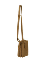 The JABARA bag by GOOD GOODS ISSEY MIYAKE is a brown, rectangular pleated gusset bag with an adjustable strap and side pleats, shown against a white background.