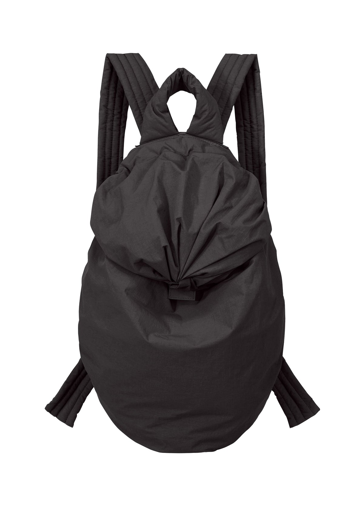 The FUWA FUWA backpack by GOOD GOODS ISSEY MIYAKE—a black, softly constructed bag with padded shoulder straps, a rounded silhouette, and a top flap closure inspired by traditional Japanese workwear—is displayed against a white background. view 1 of 8