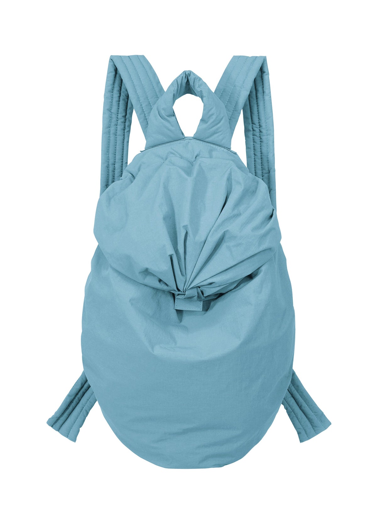 The FUWA FUWA backpack by GOOD GOODS ISSEY MIYAKE is crafted in a light blue, soft material with a slightly wrinkled texture reminiscent of traditional Japanese workwear. Featuring quilted, padded straps and a gathered, knotted top closure, its design is simple and modern. view 3 of 8