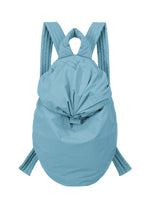 The FUWA FUWA backpack by GOOD GOODS ISSEY MIYAKE is crafted in a light blue, soft material with a slightly wrinkled texture reminiscent of traditional Japanese workwear. Featuring quilted, padded straps and a gathered, knotted top closure, its design is simple and modern. - LIGHT BLUE （no.71）