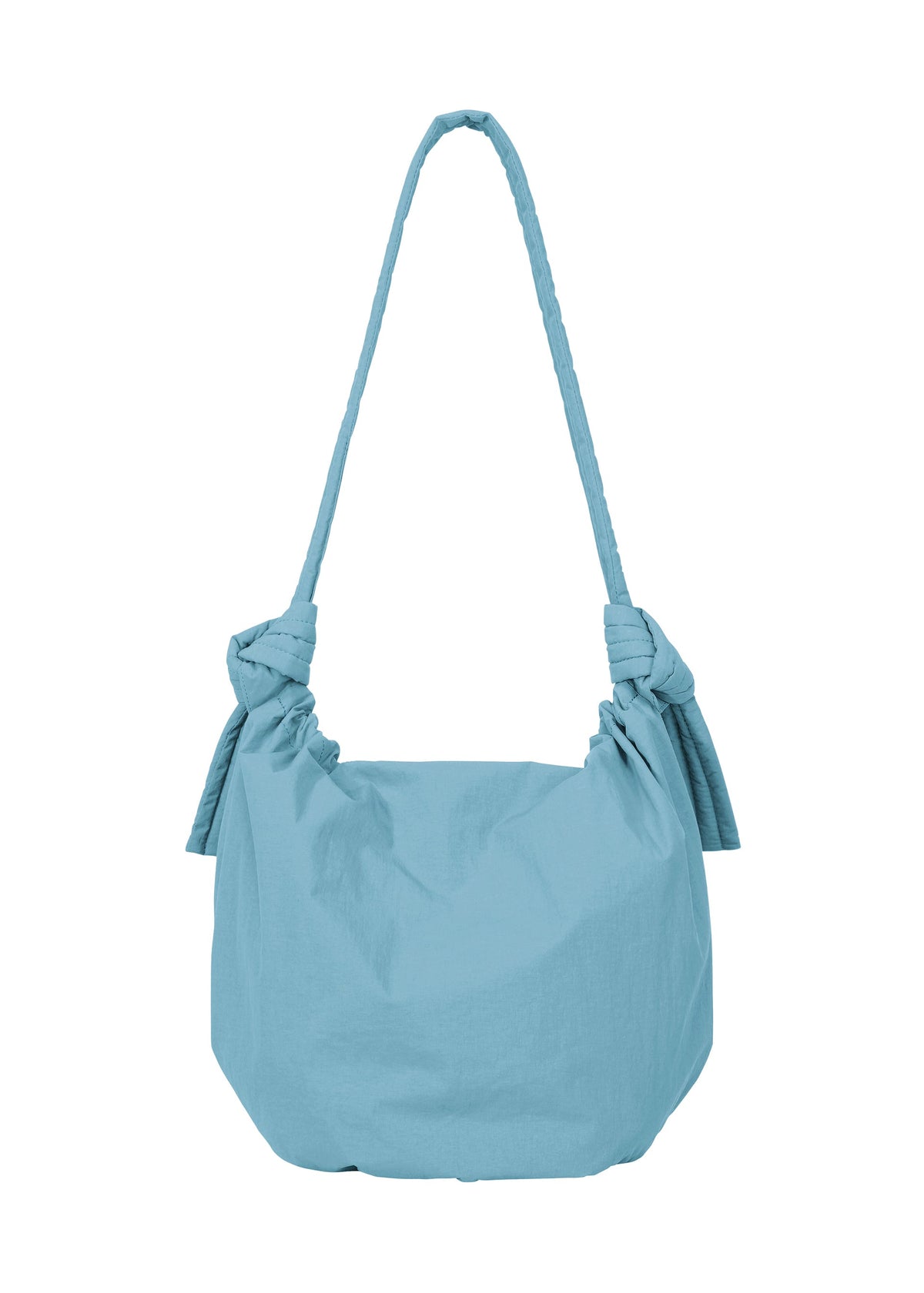 The FUWA FUWA shoulder bag from GOOD GOODS ISSEY MIYAKE features a soft, slouchy shape in light blue fabric. Inspired by traditional Japanese design, it showcases two decorative knots at the handle’s base and a long strap for comfortable over-the-shoulder wear. view 4 of 8