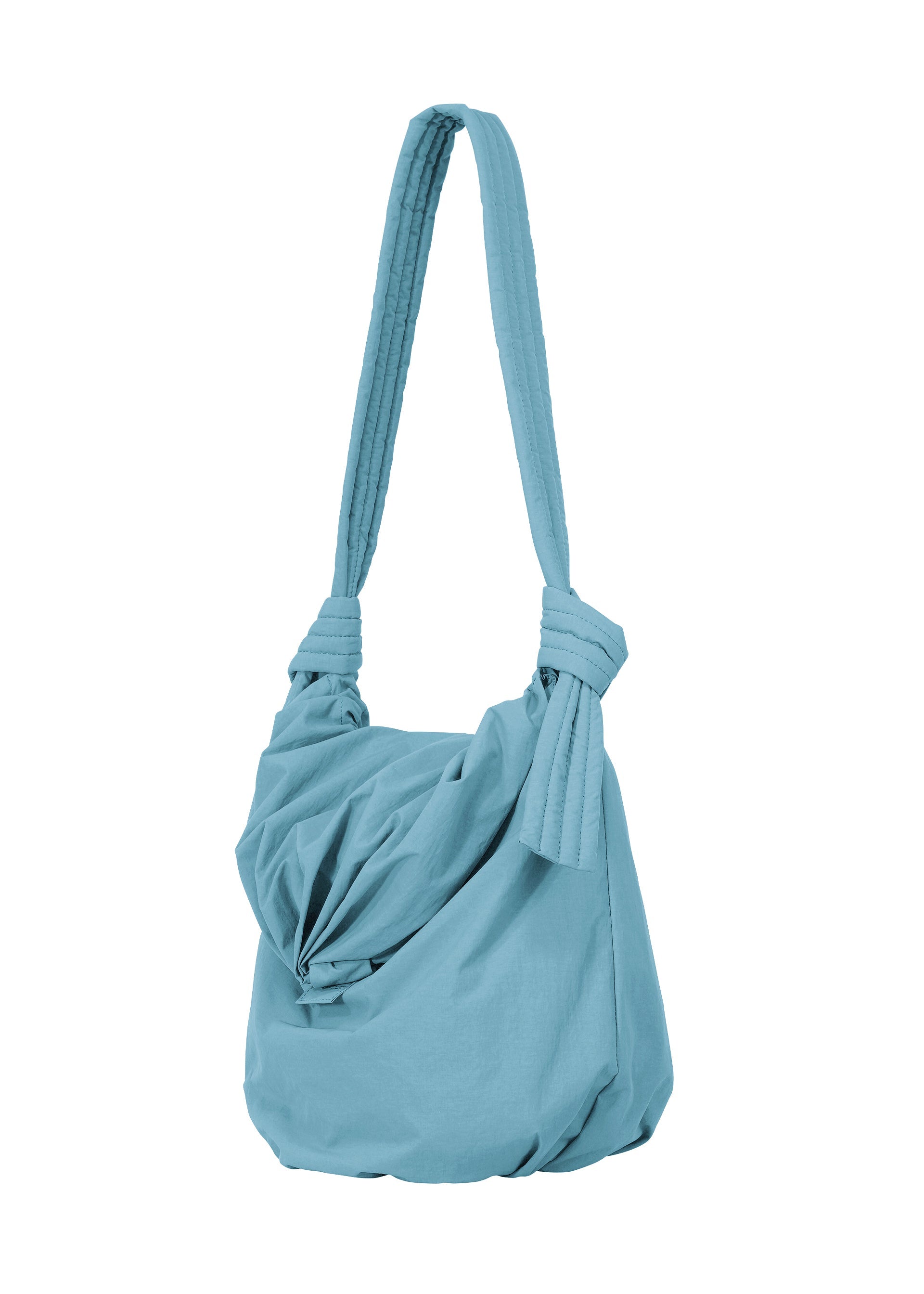 Zoomed view The FUWA FUWA by GOOD GOODS ISSEY MIYAKE is a light blue shoulder bag featuring a knotted strap and a loose, slouchy silhouette, inspired by traditional Japanese zero-waste design principles. It boasts a soft texture and an unstructured shape.