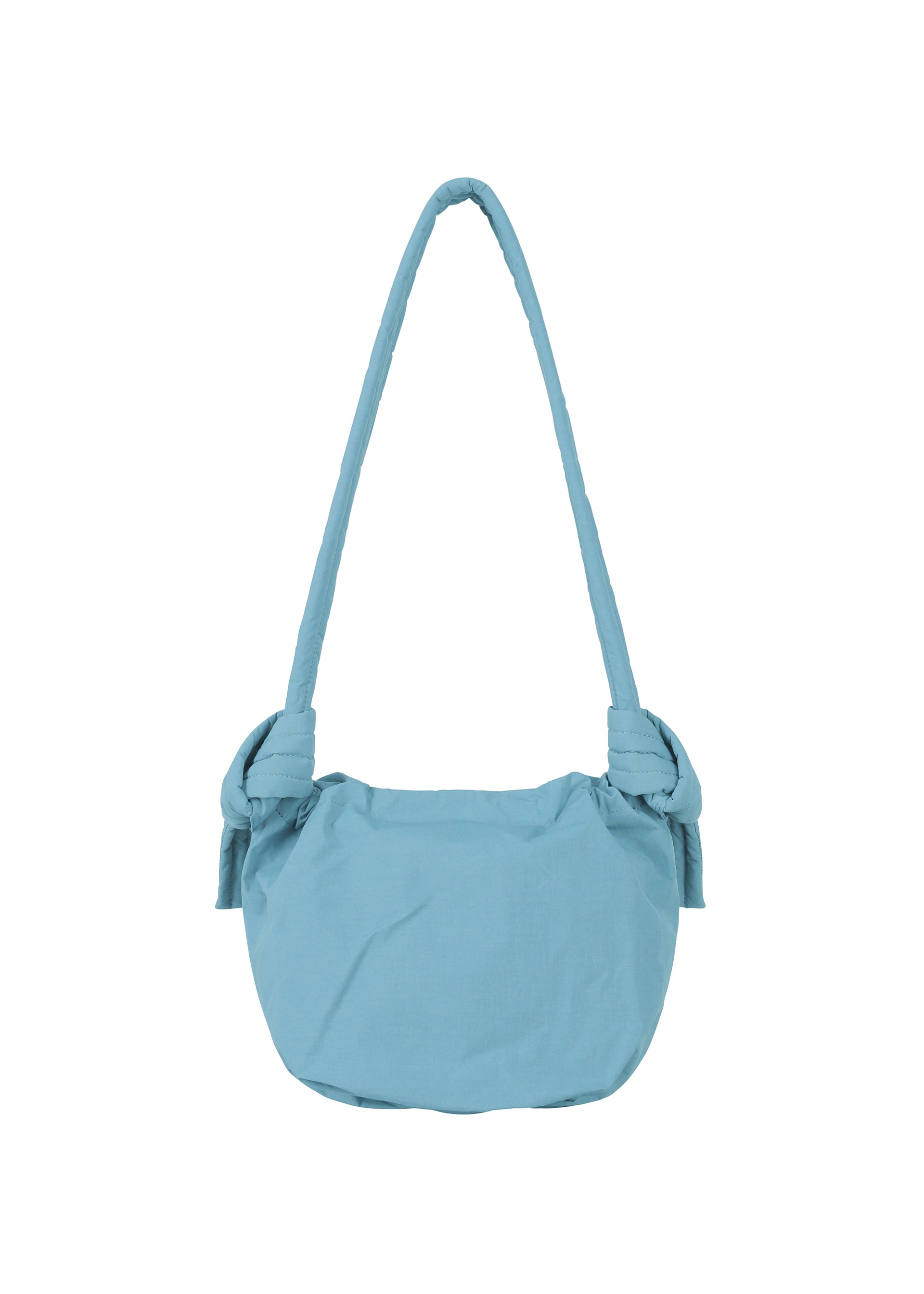 Zoomed view The FUWA FUWA by GOOD GOODS ISSEY MIYAKE is a light blue fabric shoulder bag with a rounded silhouette, featuring a long strap and distinctive knot accents at each side where the strap meets the bag—an effortless design inspired by traditional Japanese noragi style.