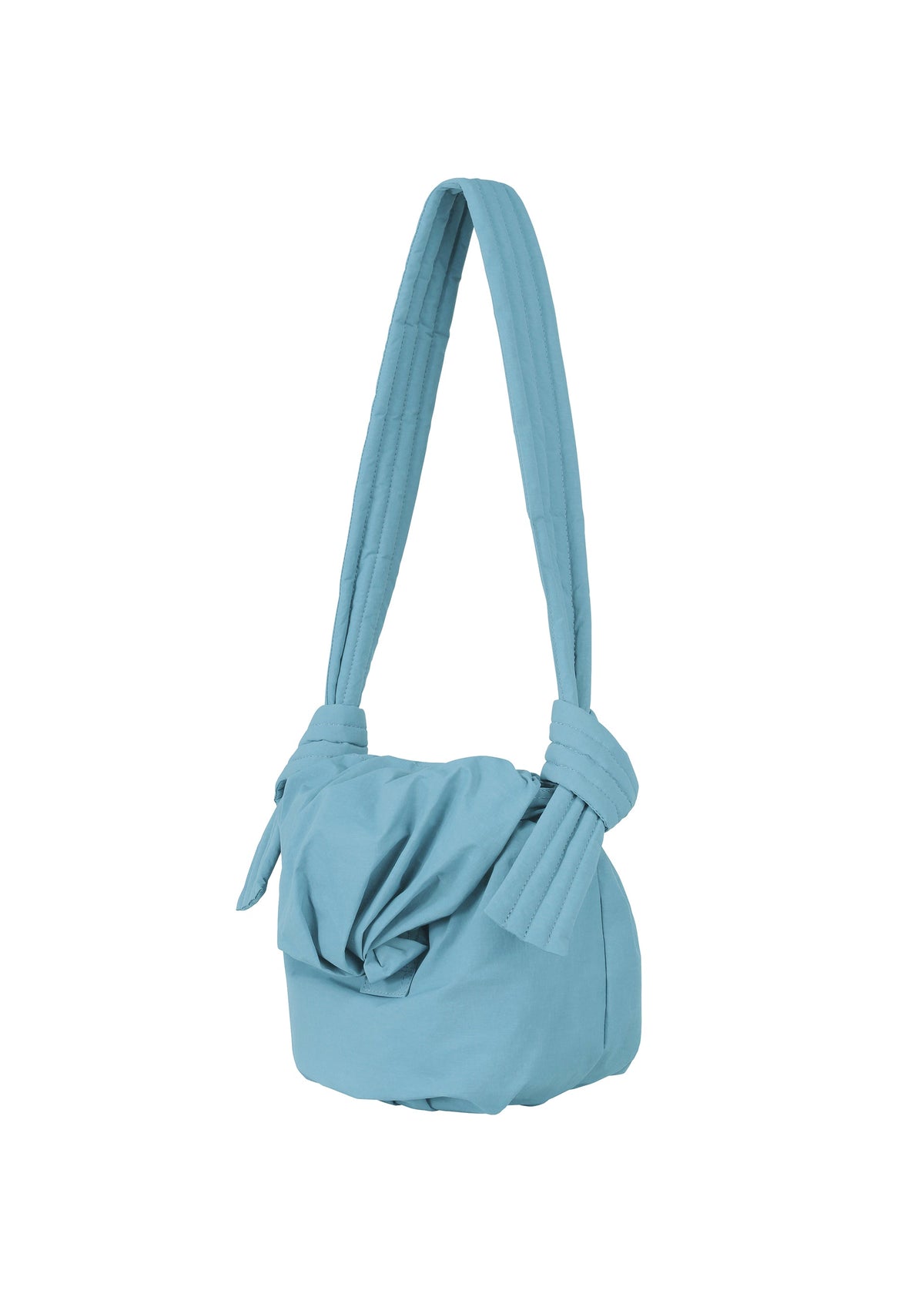The FUWA FUWA by GOOD GOODS ISSEY MIYAKE is a light blue fabric shoulder bag featuring a wide, padded strap knotted at both ends where it connects to the soft, unstructured body. The front of the bag showcases a gathered, knotted detail—a subtle nod to Japanese noragi and its emphasis on relaxed, artisanal craftsmanship. view 5 of 8