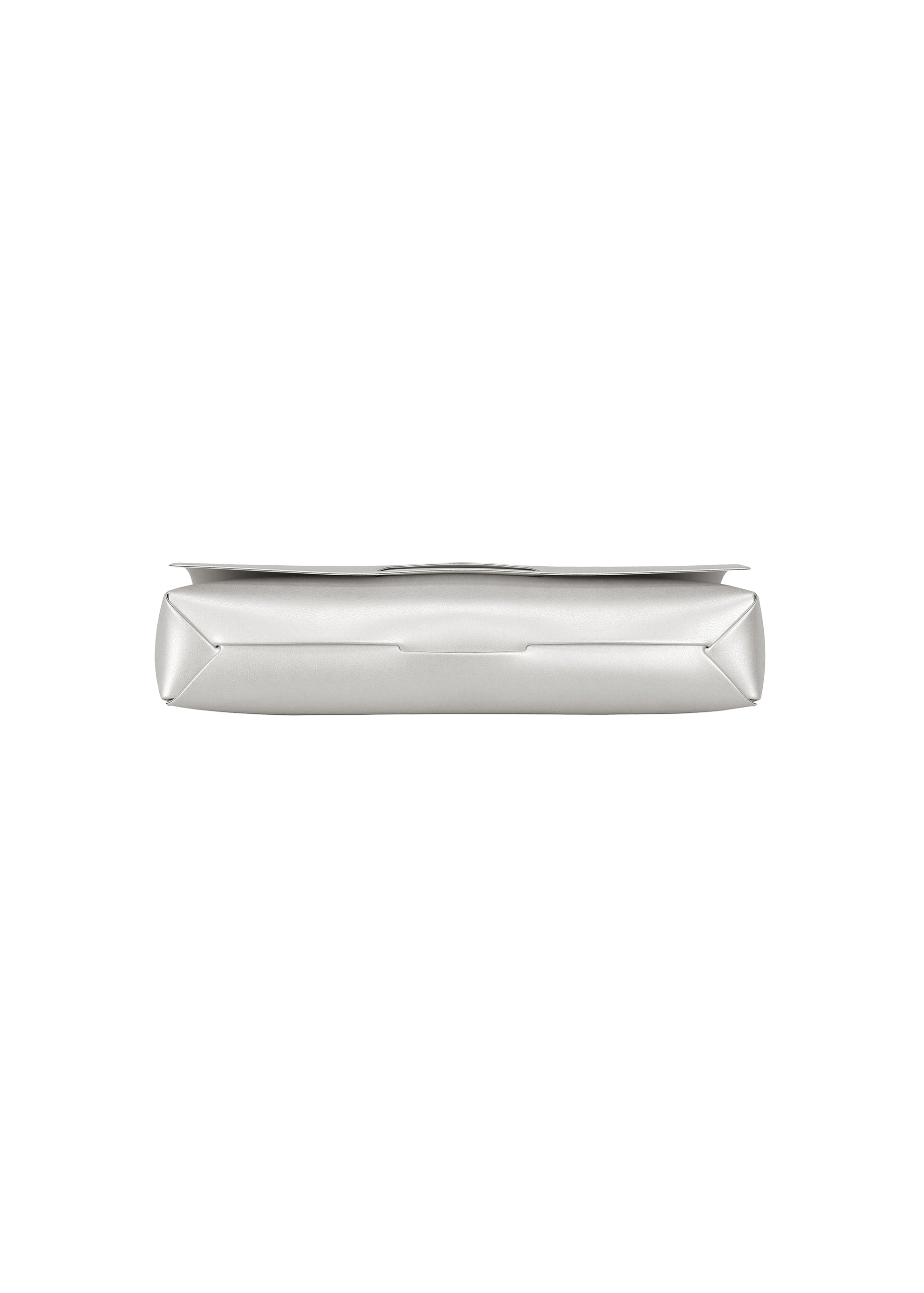 Zoomed view A silver rectangular metal object from GOOD GOODS ISSEY MIYAKE’s BOX collection is photographed from the side, showcasing its flat, smooth surface and slightly angled edges against a white background.