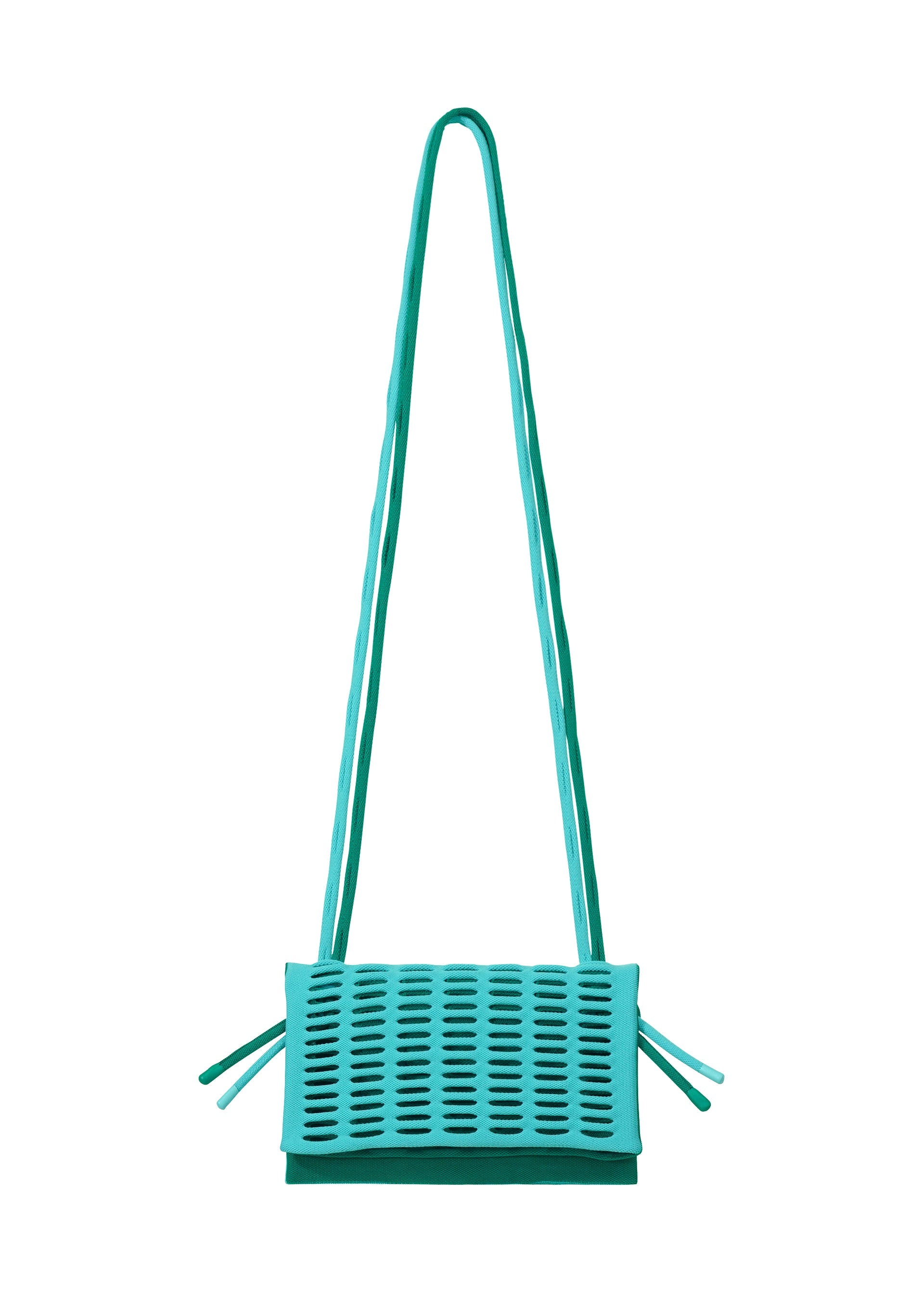 Zoomed view The MOKKO BI-COLOR by GOOD GOODS ISSEY MIYAKE is a turquoise, rectangular shoulder bag with a long strap and perforated front flap. Featuring side ties and a washable design, this stylish tote is shown against a plain white background.