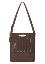 Introducing the MOKKO MONO GRIP by GOOD GOODS ISSEY MIYAKE: a stylish brown tote bag highlighted by a chic lattice pattern, featuring an adjustable shoulder strap for versatile carrying options and an oval cutout handle at the top. The bottom section of this business bag is crafted from solid fabric, seamlessly blending fashion with functionality. - BROWN （no.44）