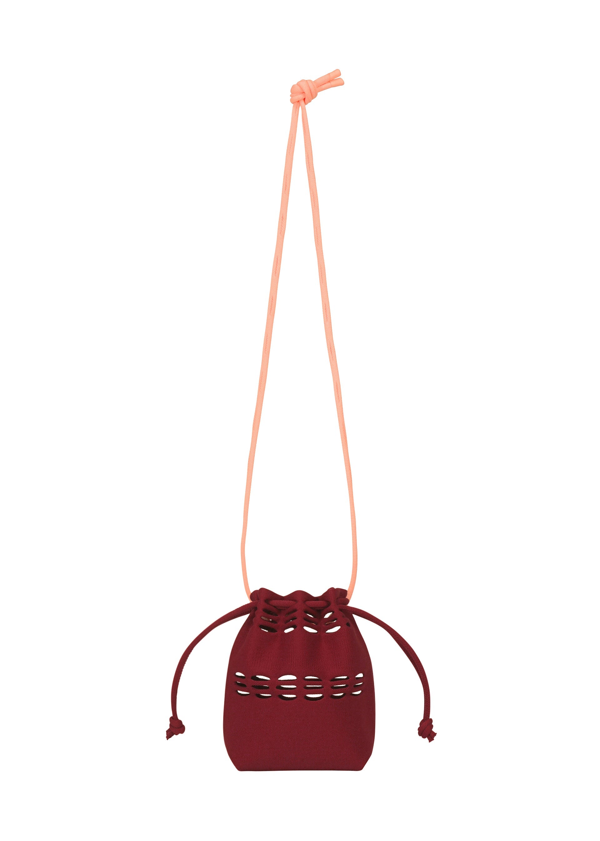 Zoomed view The MOKKO POCKET BI-COLOR by GOOD GOODS ISSEY MIYAKE is a small maroon drawstring bag with a long light pink strap and decorative cutout details, shown on a white background. - BORDEAUX （no.84）