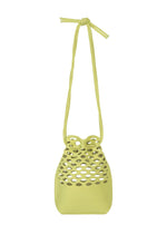 The MOKKO WASHI by GOOD GOODS ISSEY MIYAKE is a small, light green knit bag with a mesh cutout top, solid bottom, and a long twisted shoulder strap knotted at the top. - GRASS GREEN （no.63）