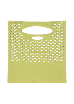 A flat, rectangular, light green MOKKO WASHI by GOOD GOODS ISSEY MIYAKE with evenly spaced oval holes and two larger top-center cutouts, resembling a summer shoulder bag, displayed on a white background.