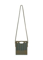 A small, rectangular crossbody from GOOD GOODS ISSEY MIYAKE’s MOKKO WALE series, woven in brown and blue stripes with a cutout handle and decorative side knots. - LIGHT BROWN×TEAL BLUE （no.47）
