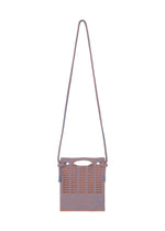 The MOKKO WALE by GOOD GOODS ISSEY MIYAKE is a small rectangular shoulder bag with a long strap, blue and orange stripes, and a top cutout handle. - CLOUDY BLUE×WARM ORANGE （no.78）