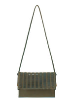 The MOKKO WALE by GOOD GOODS ISSEY MIYAKE is a green rectangular shoulder bag with a long strap, grid-patterned flap, and structured design—a modern, stylish alternative to a classic tote. - LIGHT BROWN×TEAL BLUE （no.47）