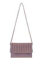 The MOKKO WALE by GOOD GOODS ISSEY MIYAKE is a rectangular woven shoulder bag with blue and brown stripes, a flap closure, and a long strap, shown on a white background. - CLOUDY BLUE×WARM ORANGE （no.78）