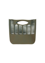 A brown, rectangular plastic MOKKO WALE basket from GOOD GOODS ISSEY MIYAKE, featuring horizontal and vertical slits, a top-center handle, and subtle two-color stripes on a white background. - LIGHT BROWN×TEAL BLUE （no.47）