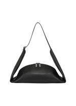 The LEAF by GOOD GOODS ISSEY MIYAKE is a sleek black leather shoulder bag with a curved shape, suede-like accents, dual top zipper pulls, and a single strap attached at both ends. - BLACK （no.15）