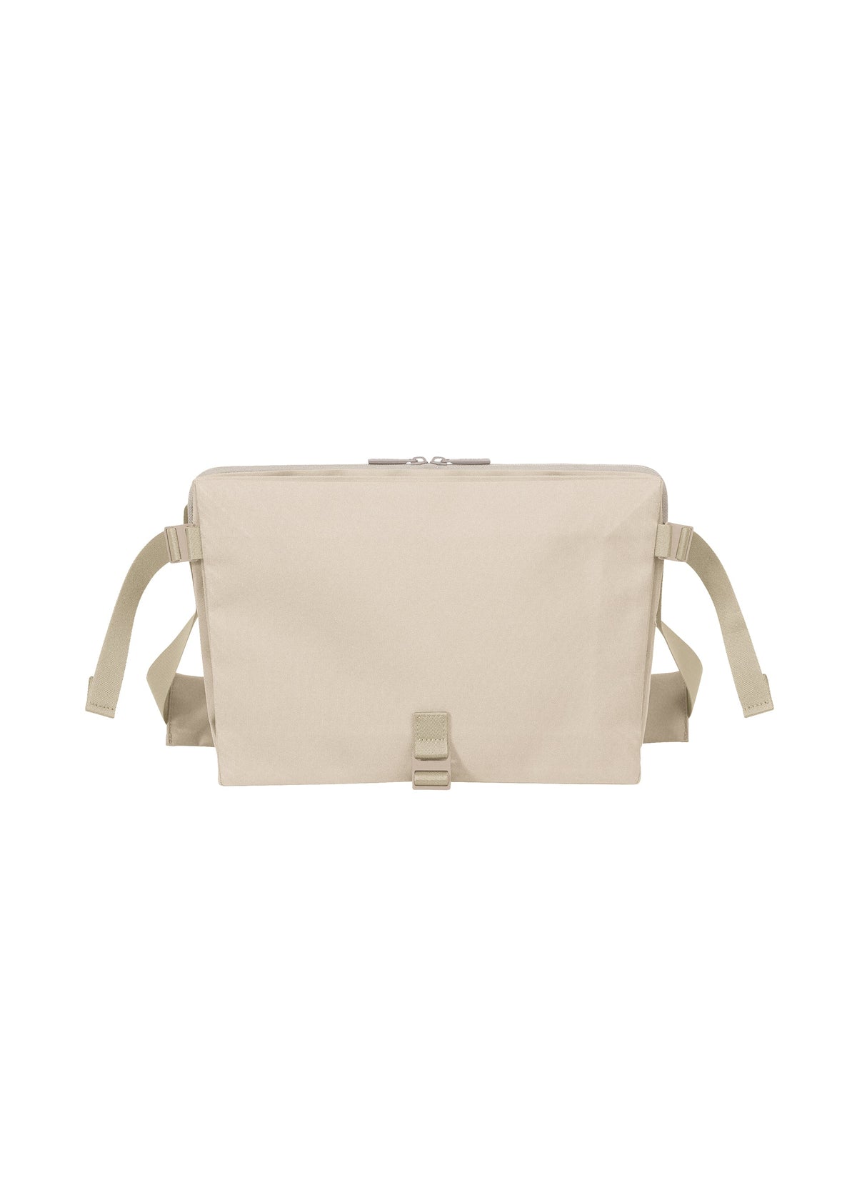 The JABARA backpack by GOOD GOODS ISSEY MIYAKE is a beige rectangular bag with a top zipper, front buckle, and adjustable shoulder straps. It features a dedicated laptop pocket and is displayed against a white background. view 1 of 11