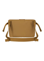 The JABARA waist bag by GOOD GOODS ISSEY MIYAKE is a rectangular tan accessory with two zippered front pockets, an adjustable strap, and subtle accordion pleat detailing, shown against a white background.
