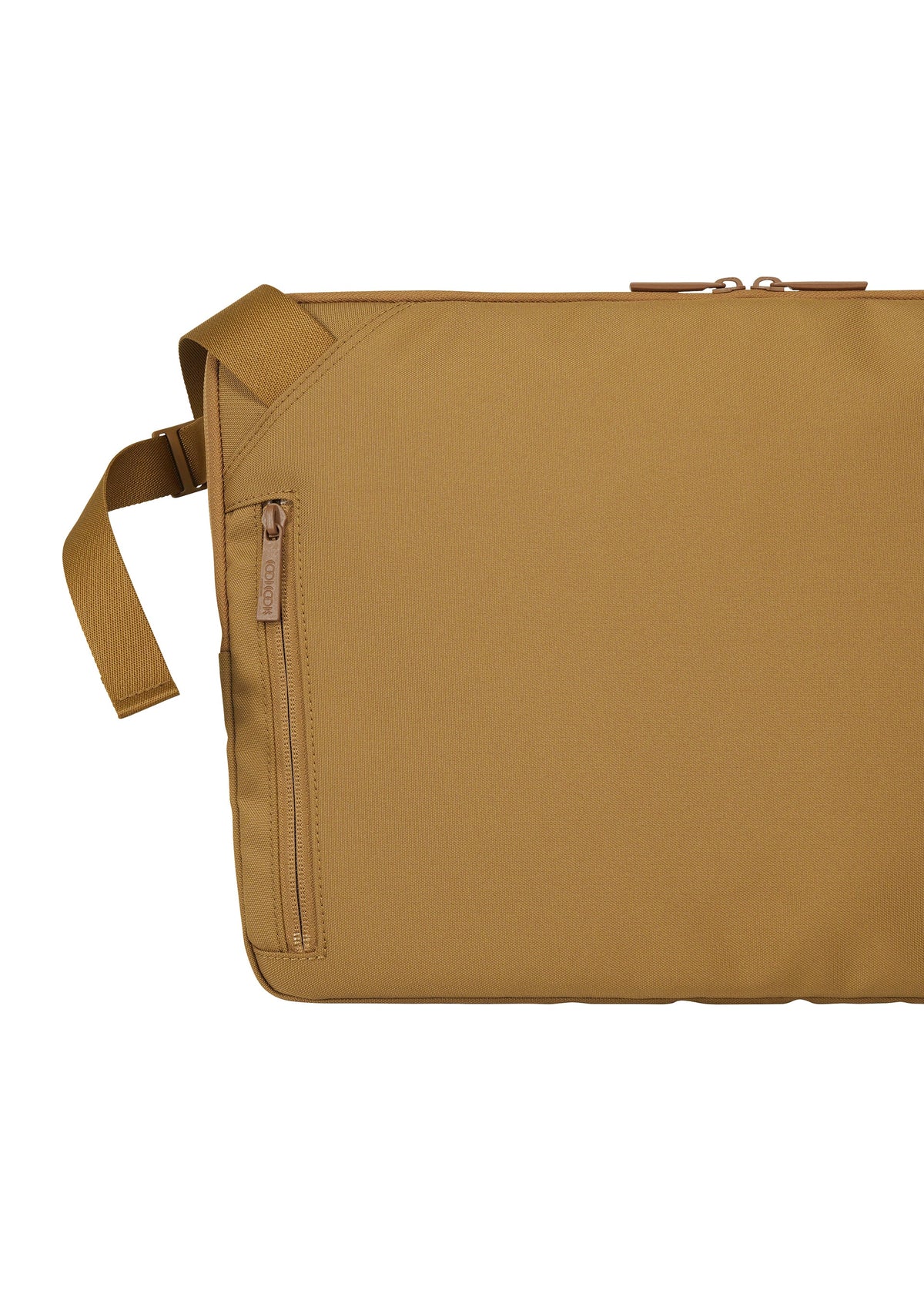 The JABARA laptop sleeve by GOOD GOODS ISSEY MIYAKE features tan fabric with a diagonal zipper pocket, a dedicated laptop compartment, a brown zipper pull, and an adjustable strap. Photographed against a white background. view 6 of 11