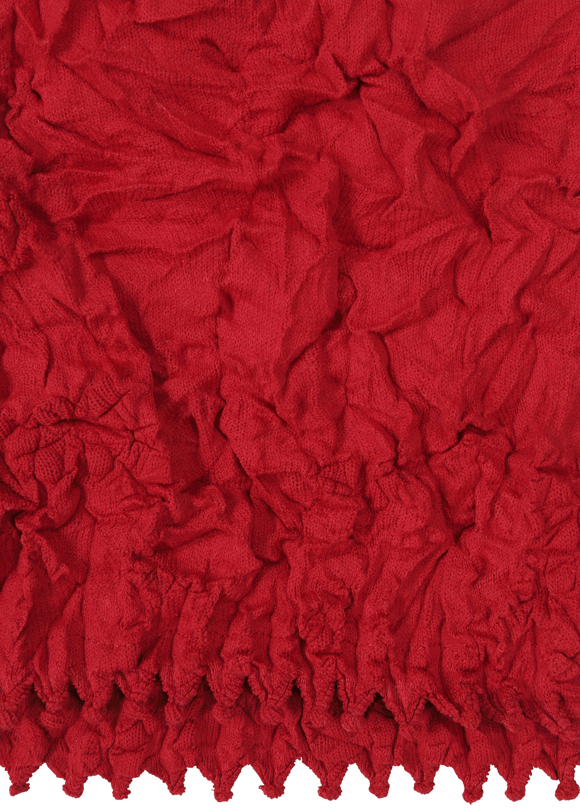 Zoomed view Close-up of HaaT's KUMO SHIBORI KNIT: a red, crinkled recycled polyester fabric featuring gathered ruching and visible folds, evoking the traditional wrinkled patterns of Kumo Shibori.