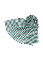 The HaaT 2 SIDE PINTUCKING stole, featuring a green and white checked pattern, is rolled from one end to form a spiral shape at the top right corner against a white background. - BLUE （no.72）