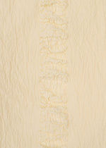 A close-up of HaaT's TENMOKU COTTON in cream shows gently wrinkled, soft garment-dyed fabric with a vertical textured ruffled stripe—ideal for a sleeveless top with subtle detailing.
