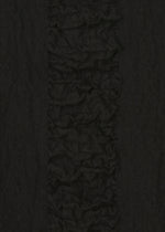 Close-up of HaaT's TENMOKU COTTON: textured black fabric with a vertical ruffled stripe and a mottled pattern inspired by Tenmoku glaze, contrasted by smoother fabric on each side.