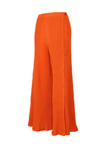The HaaT KYO CHIJIMI MAY pants in bright orange feature ultra-fine cotton yarn and a unique loom texture. Displayed on a white background, they have an elastic waistband and a loose, flowing fit for comfort and style.