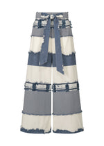 The KASANEGAKE wide-leg pants by HaaT feature blue and off-white jacquard stripes, a high waist with a matching belt, varied textures, and frayed stripe edges for a unique layered look. - BLUE （no.72）