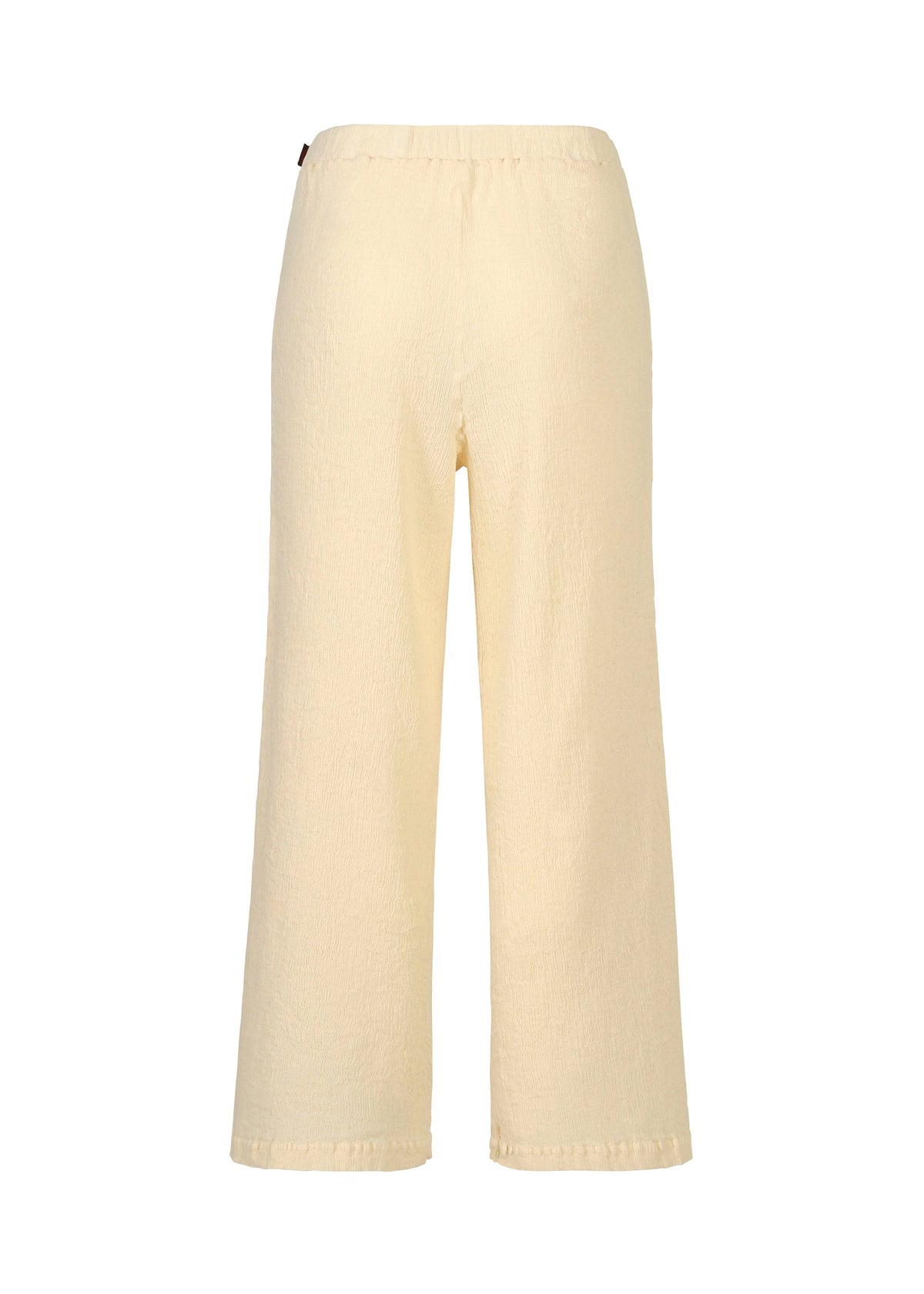 Back view of loose-fitting, pale yellow KYO CHIJIMI ITAJIME pants by HaaT, featuring an elastic waistband and wide legs in ultra-fine cotton yarn with unique loom texture, shown on a plain white background. view 2 of 6