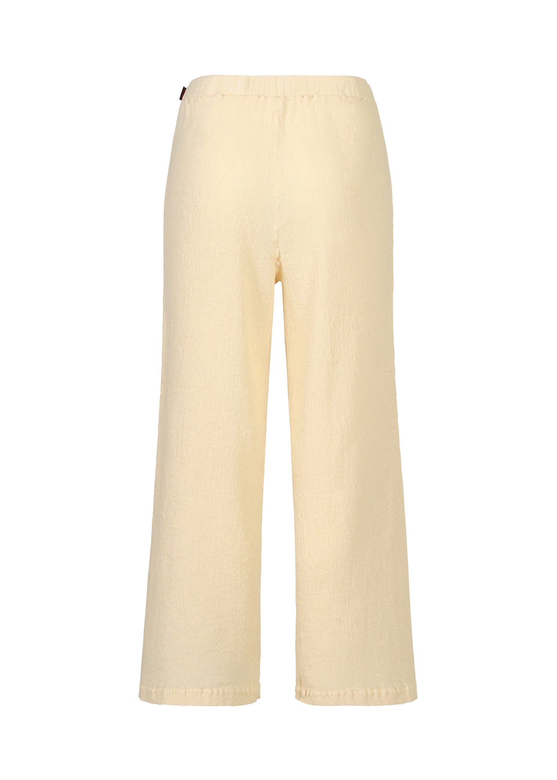 Zoomed view Back view of loose-fitting, pale yellow KYO CHIJIMI ITAJIME pants by HaaT, featuring an elastic waistband and wide legs in ultra-fine cotton yarn with unique loom texture, shown on a plain white background.